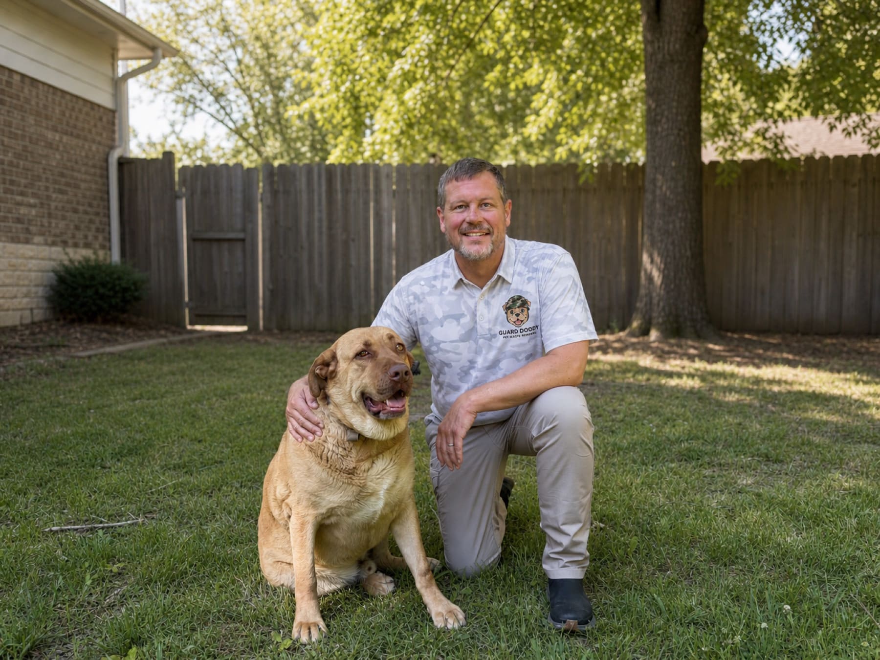 Christopher Glass, owner of Guard Doody, with a dog